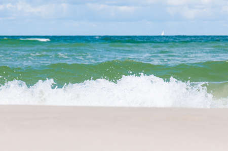 coast with a beach and turquoise water in the seaの写真素材