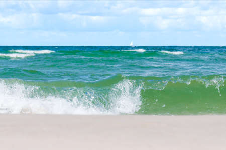 coast with a beach and turquoise water in the seaの写真素材