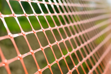 Plastic safety net for construction site. Construction mesh.の写真素材