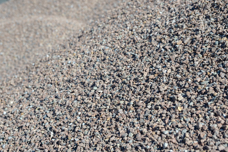 Breakstone background. Road gravel. Gravel texture. Crushed Gravel background. Piles of limestone rocks. Break stones on construction site.の写真素材