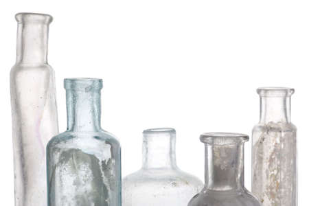 Antique bottles on white isolated backgroundの写真素材