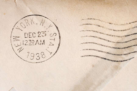 Vintage yellowed envelope with postmark stampの写真素材