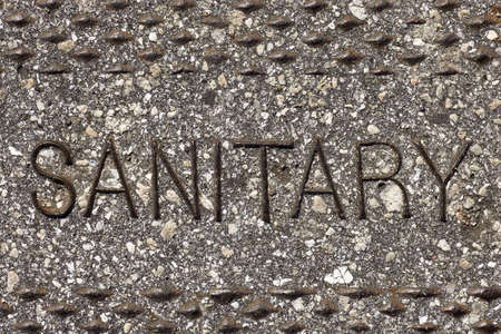 sanitary sewer sign background macro close upの写真素材