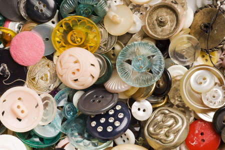 many kinds of different antique buttons backgroundの写真素材