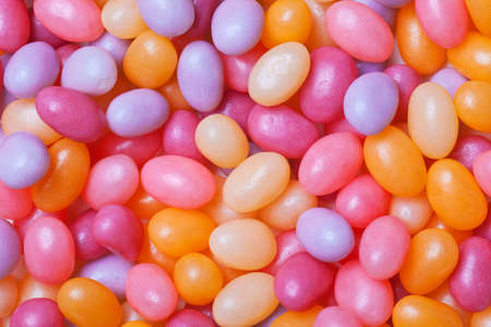 jelly beans multi colored backdrop or backgroundの写真素材