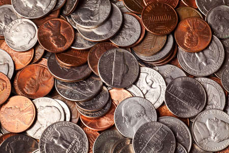 pennies, nickles, dimes, and quarters macro backgroundの写真素材