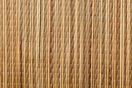 grass mat background in brown tonesの写真素材