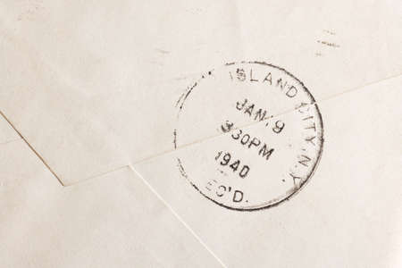 Vintage yellowed envelope with postmark stampの写真素材