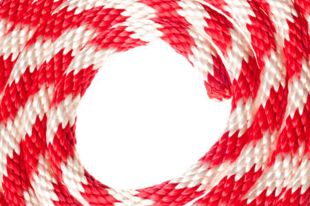 red and white nylon rope isolated on a pure white backgroundの写真素材