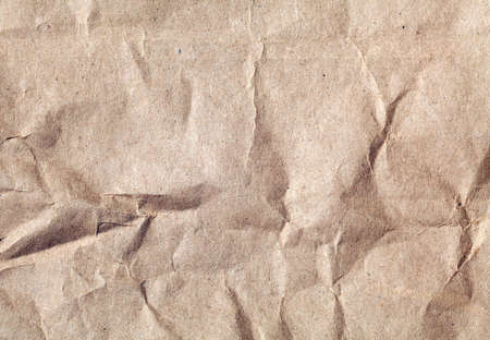 crumpled and wrinkled grunge paper background or backdropの写真素材