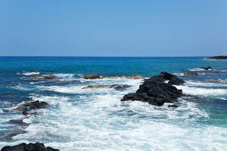 Coastal view on the Big Island of Hawaii with lava rocksの写真素材
