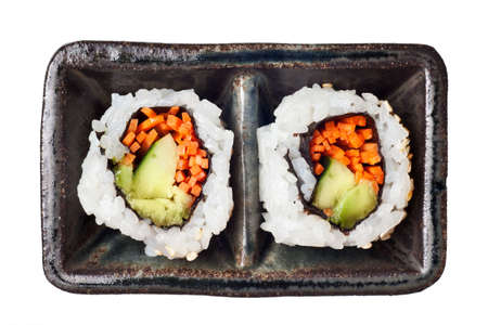 Vegetarian sushi California roll with rice and seaweed isolated on white backgroundの写真素材