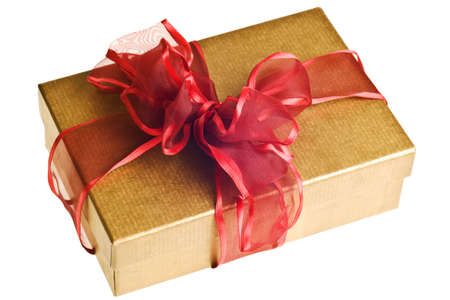gold gift with red bow isolated on white backgroundの写真素材