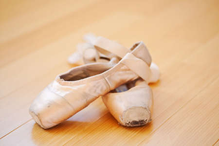 ballet slippers in a well-worn conditionの写真素材