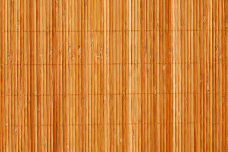 natural bamboo slatted mat background in brown tonesの写真素材