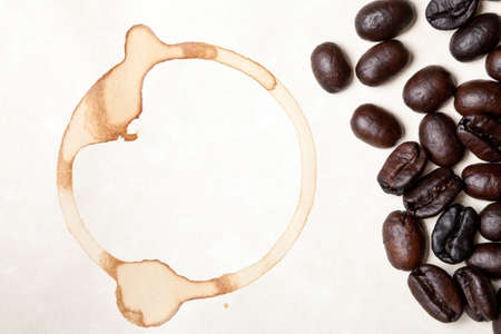 coffee beans on a parchment paper backgroundの写真素材