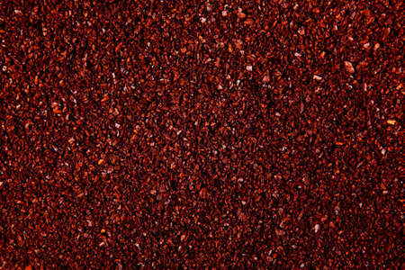 brown coffee grounds arranged as a backgroundの写真素材