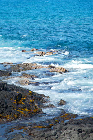 Coastal view on the Big Island of Hawaii with lava rocksの写真素材