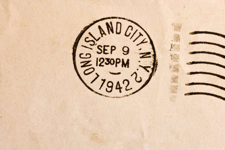 Vintage yellowed envelope with postmark stampの写真素材