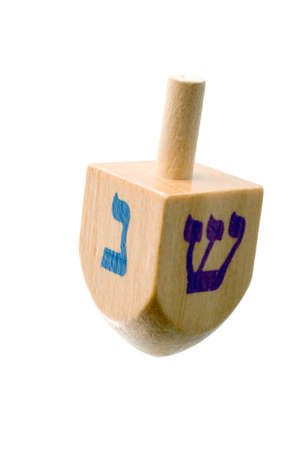 Hanukkah dreidel, isolated on white background.の写真素材