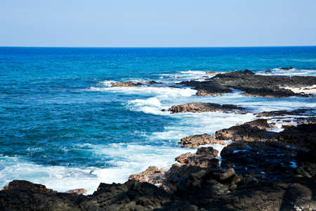 Coastal view on the Big Island of Hawaii with lava rocksの写真素材