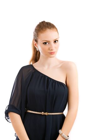Beautiful blonde young lady posing in studioの写真素材