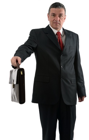 Older businessman with briefcase isolated on white backgroundの写真素材