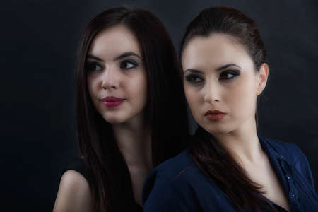 Portrait of two young women close togetherの写真素材