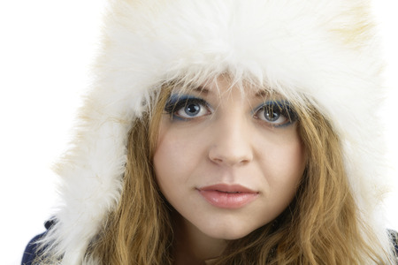 Fur Fashion Hat. Beautiful Girl in Furry Hat. Winter Woman Portraitの写真素材