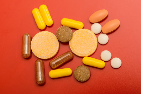 different drugs isolated on red background
