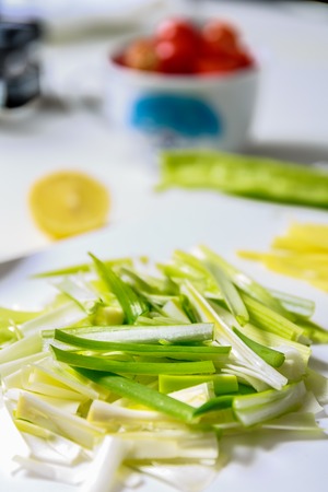 A close up image of chopped spring onionsの写真素材