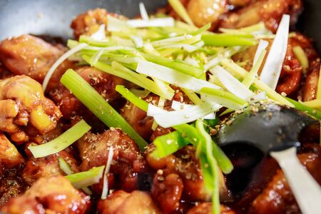 Closeup of caramelized asian chicken wings with selective focusの写真素材