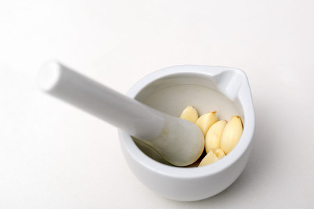ceramic mortar with garlic