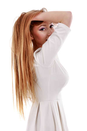 a beautiful woman with long hair isolated on white backgroundの写真素材