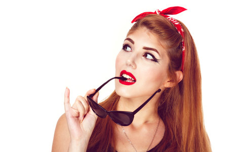 young stylish caucasian woman posing, retro styling, space for copy