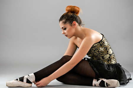 Professional female ballet dancer isolated in studioの写真素材