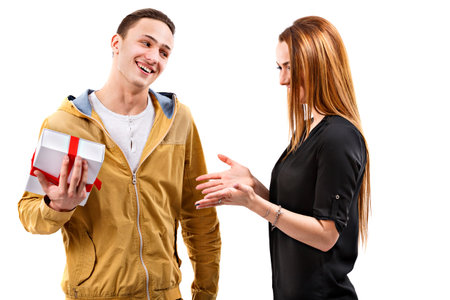 young man gives gift, valentines day themeの写真素材