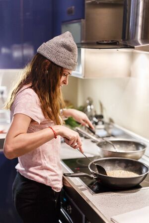 woman cooking in the kitchenの写真素材