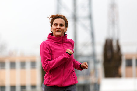 Healthy lifestyle - woman running, jumping
