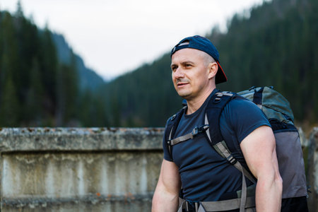 Man Traveler with backpack mountaineering Travel Lifestyle concept
