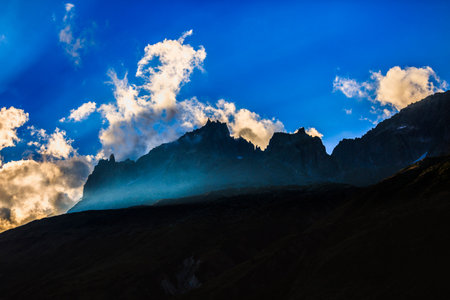 dramatic picture with mountain peak in alps