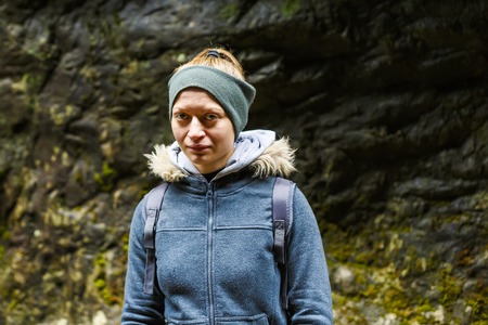 Closeup portrait of a beautiful tourist woman outdoorの写真素材