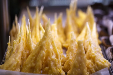 variety of sweets in a shop windowの写真素材