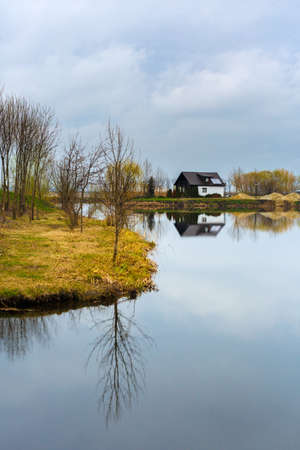 beautiful abstract landscape with trees and lakeの写真素材