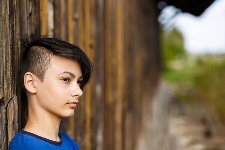 Portrait with a beautiful young Asian boyの写真素材