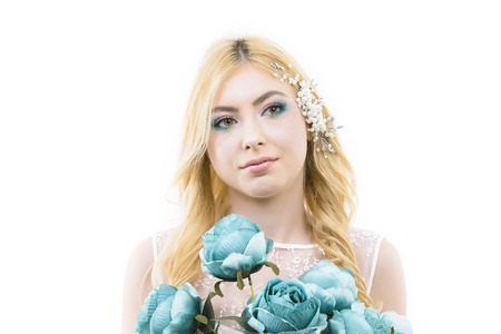 portrait with a beautiful young woman, makeup for the brideの写真素材