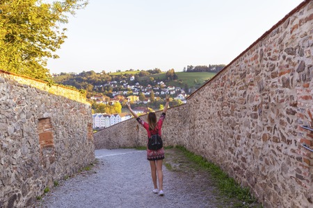woman tourist walking on the street, summer fashion style, travel to Europeの写真素材