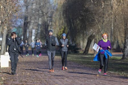 Sports event involving people of different ages organized at the centenary of the Great Romanian unions from 1918 in the city of Pitesti, Arges, Romania (09-12-2018)のeditorial素材