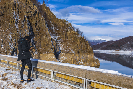 Young mountain tourist during the winterの写真素材