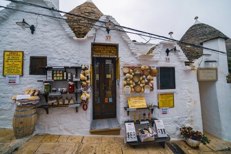 ALBEROBELLO, APULIA, ITALY - FEBRUARY 03 - Beautiful view of the traditional trulli houses with their conical roof on february 03, 2019 in Alberobelloのeditorial素材